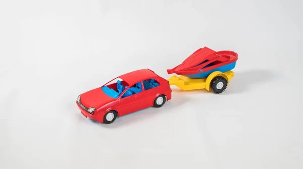 Plastic Speelgoed Veelkleurige Auto Geïsoleerd Witte Achtergrond Een Auto Met — Stockfoto