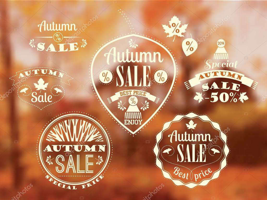 Set of Autumn Sale Labels and Signs With Retro Typography . Vector blurred background