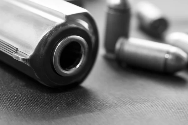 Handgun with cartridge on the black background — Stock Photo, Image