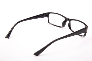 Stylish glasses with black frames on a white background