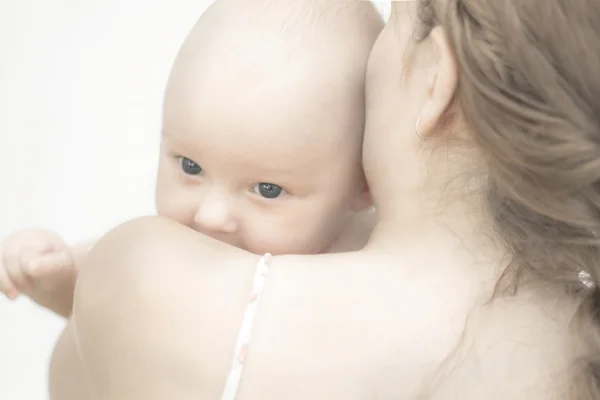 stock image Young mother hugging her beautiful newborn baby boy