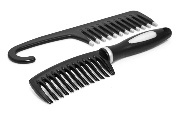 Plastic comb on a white background — Stock Photo, Image