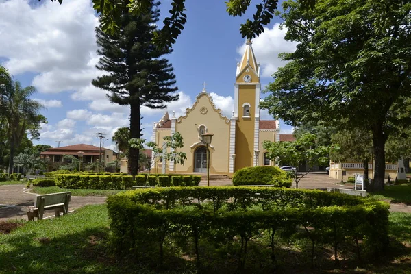 Town square. With church in the background and bandstand in a town square with a panoramic view of the trees in a city in Brazil, South America