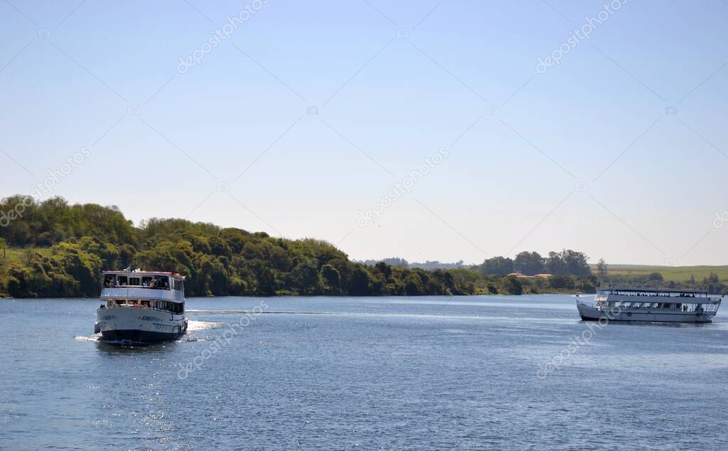 BARRA BONITA, BRAZIL, SOUTH AMERICA, OCT, 29, 2018, Ships sailing on sightseeing tour in tourist town to visit the Tiete River lock in inner city of Sao Paulo, Brazil, South America