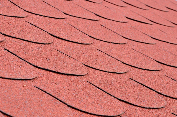 Red shingles on a roof in close up — Stock Photo, Image