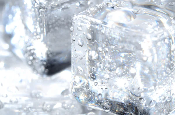 Macro detail of ice cubes with water droplet Stock Picture