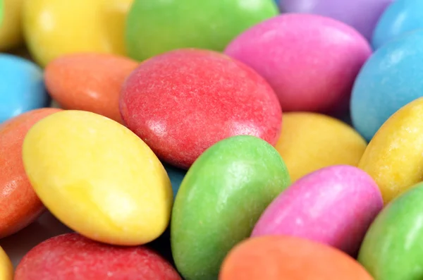 Closeup detail of pile of colored smarties texture — Stock Photo, Image