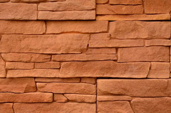 Red stone cladding texture — Stock Photo, Image