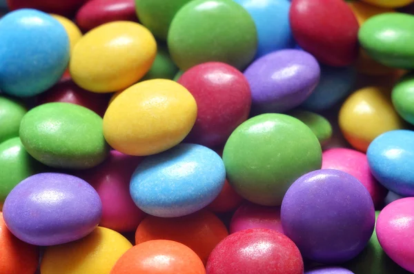 Makro detail hromadu barevných lentilky — Stock fotografie
