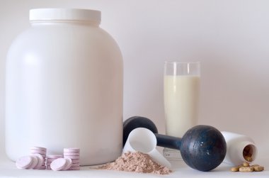 Big jar of protein powder, dumbbell, milk, pills and tablets clipart