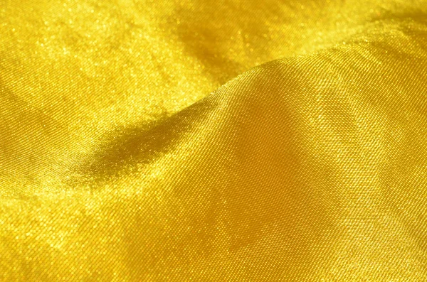Detalhe close-up de cetim de ouro — Fotografia de Stock