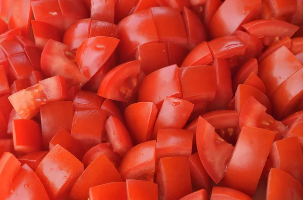 Chopped tomatoes pieces — Stock Photo, Image
