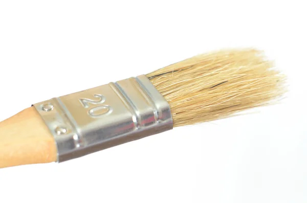 Middle-size paint brushes on a white background — Stock Photo, Image