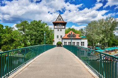 Berlin, Germany - May 21, 2021: Historic abbey bridge to the Insel der Jugend in Berlin-Treptow with the striking bridge tower.