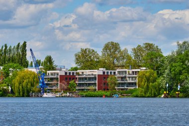 Berlin, Germany - May 21, 2021: Scene at the river Spree in Berlin-Treptow near the Insel der Jugend.