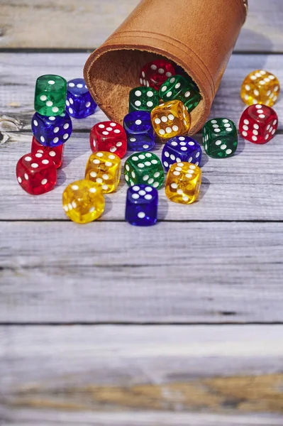 View Different Colored Game Dices Dice Cup Wooden Table — Stock Photo, Image