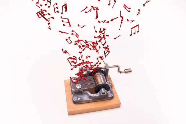 Müzik kutudan beyaz arka plan üzerinde uçan müzik notlar