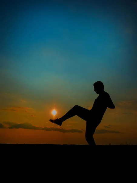 Soccer player hit the sun — Stock Photo, Image