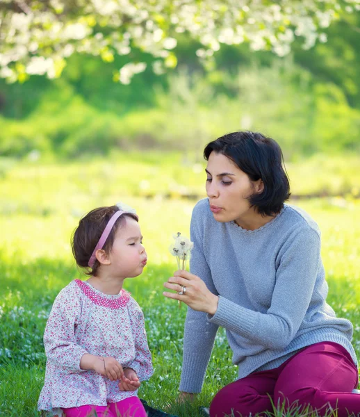 Daughter with her mother together outdoors — Stock Photo, Image