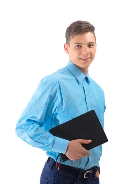 Adolescente feliz sostiene un libro grande aislado en blanco —  Fotos de Stock