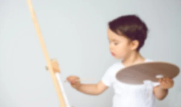 Blurred image of kid drawing and painting — Stock Photo, Image