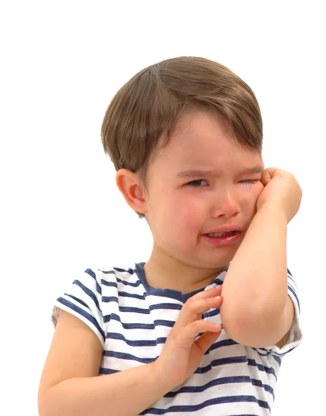 Sad unhappy crying cute little young toddler girl wiping tears, isolated. — Stock Photo, Image