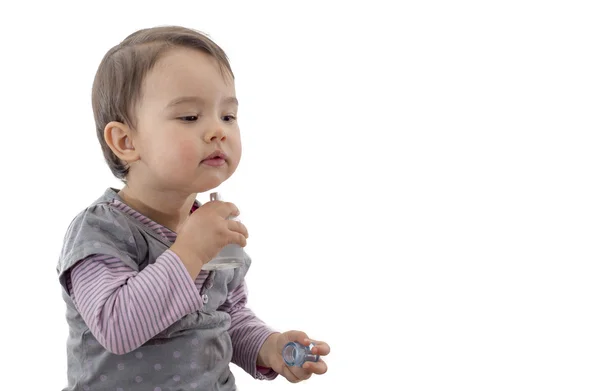 Toddler with perfume — Stock Photo, Image