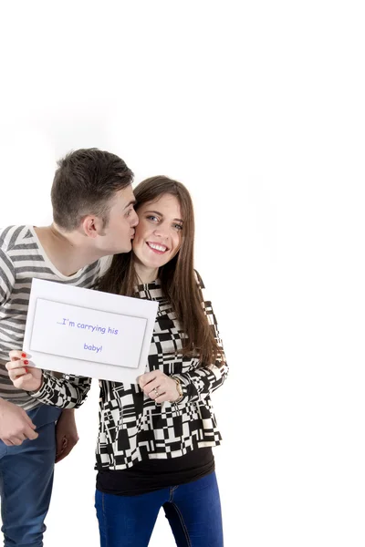 Casal jovem anunciando seu bebê — Fotografia de Stock