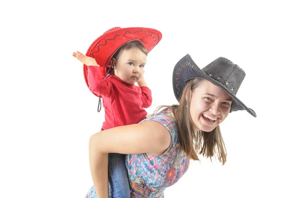 Duas meninas piggybacking isolado no branco — Fotografia de Stock