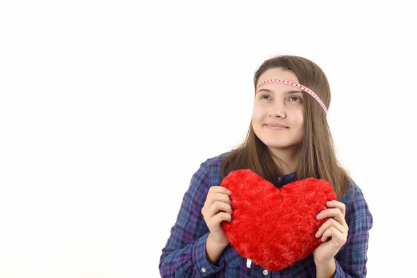 Jovencita sosteniendo un corazón rojo —  Fotos de Stock