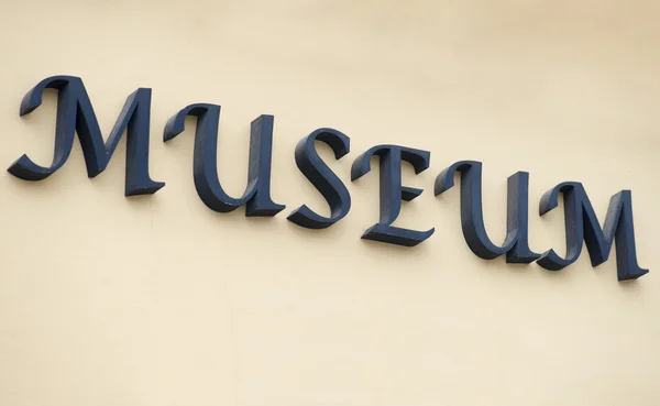 Museum sign written on a building — Stock Photo, Image