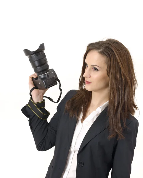 Young lady with a camera in her hand — Stock Photo, Image