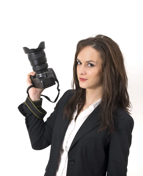 Young lady with a camera in her hand — Stock Photo, Image