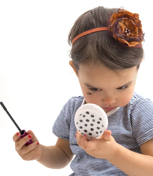 Fashion little girl applying make up — Stock Photo, Image