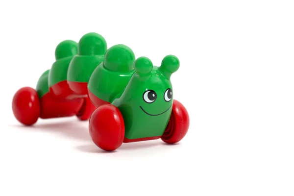 Brinquedo lagarta verde isolado — Fotografia de Stock