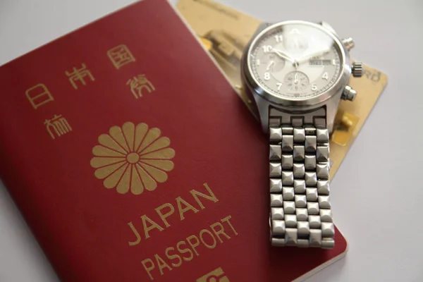 Japoński paszport i zegarek — Zdjęcie stockowe