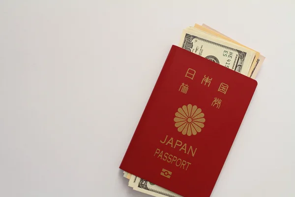 Japanse paspoort en ons dollar — Stockfoto