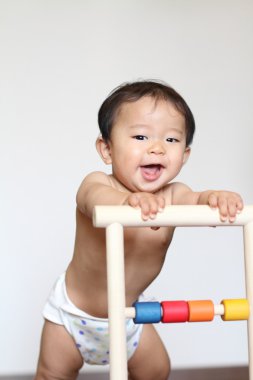 Bir kart (0 yaşındaki bastırmak erkek Japon bebek)