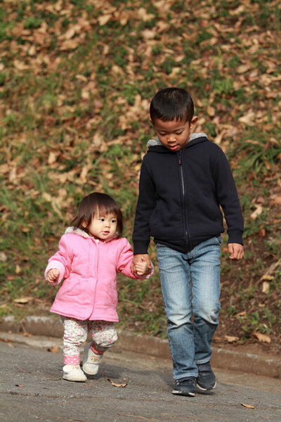 Japanese brother and sister taking a walk (6 years old boy and 1 year old girl)