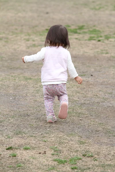 https://st2.depositphotos.com/3746139/10888/i/450/depositphotos_108885456-stock-photo-japanese-girl-walking-on-the.jpg