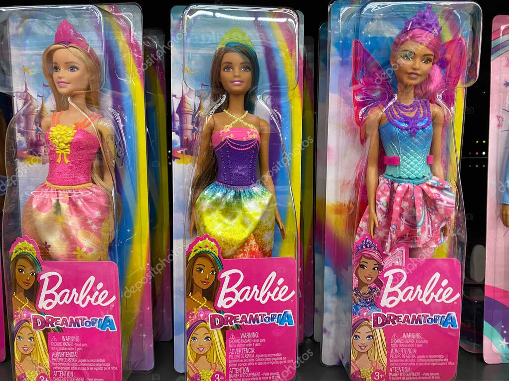 Viersen, Germany - November 9. 2020: Close up of dreamtopia barbie dolls packets in shelf of german supermarket