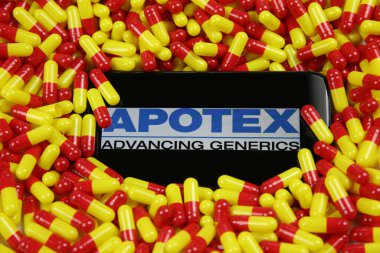 Viersen, Almanya - 9 Nisan. 2020: Kanadalı Apotex ilaç firmasının amblemi ile cep telefonu ekranının kapatılması (harf merkezine odaklanın))