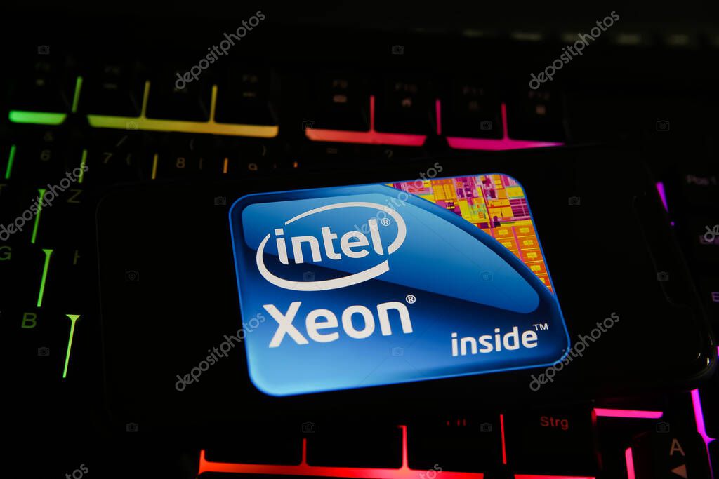 Viersen, Germany - May 8. 2021: Closeup of smartphone with logo lettering of intel xeon processor cpu on computer keyboard