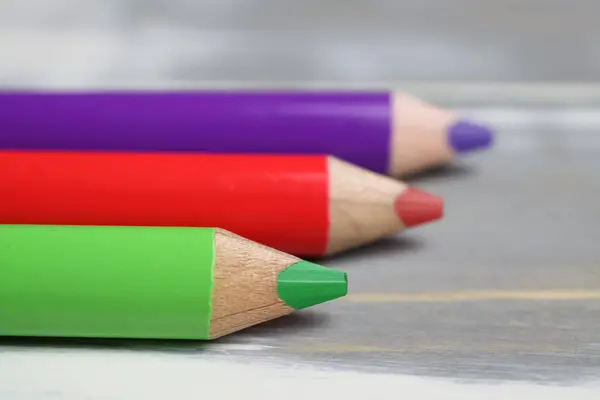 Closeup Isolated Colorful Red Green Crayons Wood Background — 스톡 사진