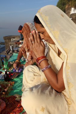Unidentified devout Hindu pilgrim prays clipart