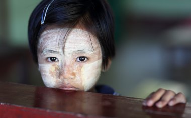 Burmese girl with Thanaka in Bagan, Myanmar clipart