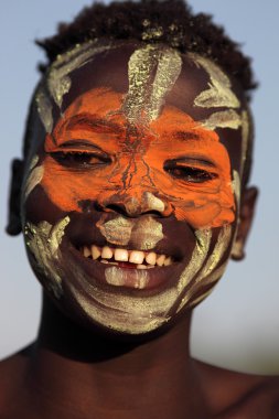 Unidentified young Suri man with face painting clipart