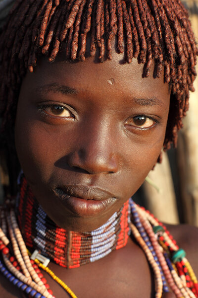 An unidentified young Hamer woman