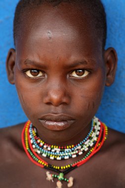 Hamer boy in Dimeka, Lower Omo Valley, Ethiopia clipart