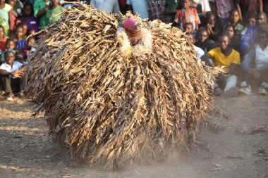 Traditional Nyau dancer with face mask